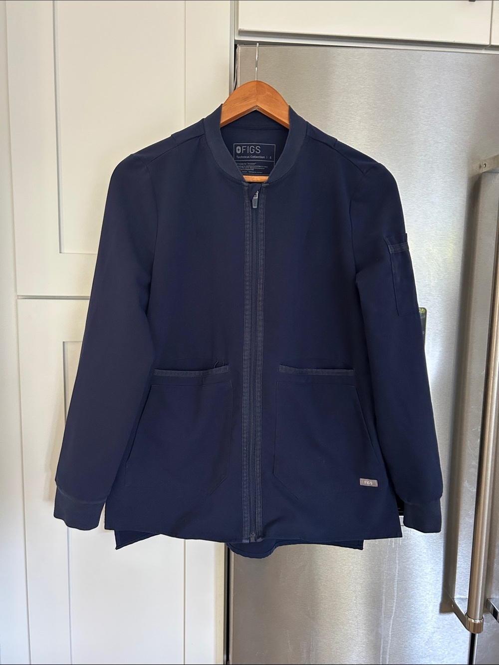 FIGS women’s navy blue jacket